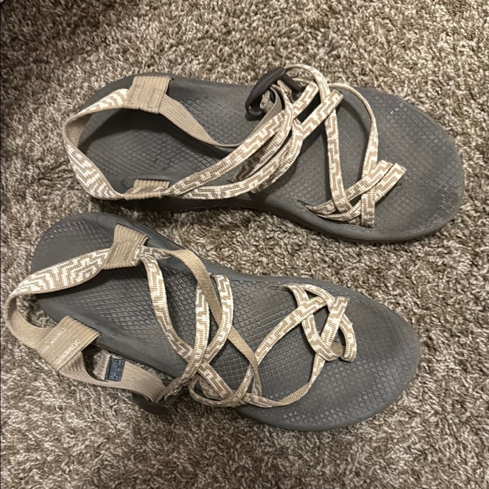 Chaco Tan and Black Sandals with Strappy Design and Flat Sole